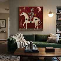 Painted Saddle Follow the Dust Road - symbolic horse and rider painting by Isabelle Laurent, modern Western square wall art – styled room scene view 5