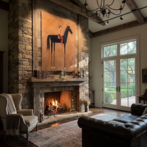 Long Mane Follow the Dust Road - horse and rider painting by Isabelle Laurent, modern Western vertical wall art – styled room scene view 5