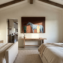 Moonlit Horse Follow the Dust Road - figure and horse painting by Isabelle Laurent, modern Western horizontal wall art – styled room scene view 4