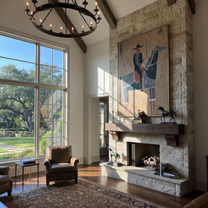 Long Mane Guard the Silence - horse and rider painting by Isabelle Laurent, modern Western vertical wall art – styled room scene view 5