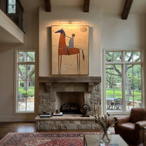 Wild Grace Guard the Silence - horse and rider painting by Isabelle Laurent, modern Western vertical wall art – styled room scene view 2