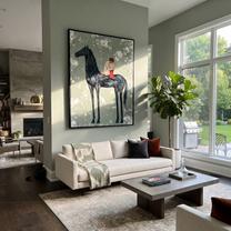 Sage Horizon Guard the Silence - figure and horse painting by Isabelle Laurent, modern Western vertical wall art – styled room scene view 5