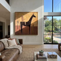 Still Hooves Move through Olive - horse and rider painting by Isabelle Laurent, modern Western square wall art – styled room scene view 1