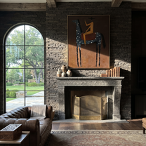 Western Stars Rise into Light - horse and rider painting by Isabelle Laurent, modern Western vertical wall art – styled room scene view 3