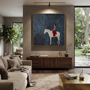 Desert Rhythm Rise into Light - horse and rider painting by Isabelle Laurent, modern Western square wall art – styled room scene view 1