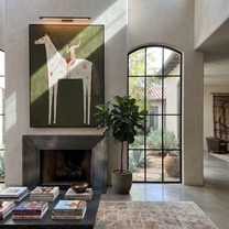 Quiet Reins Share the Long Journey - symbolic horse and rider painting by Isabelle Laurent, modern Western vertical wall art – styled room scene view 5