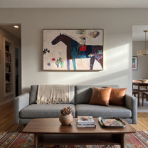 Painted Saddle Share the Long Journey - folk horse painting by Isabelle Laurent, modern Western horizontal wall art – styled room scene view 2