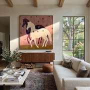 Midnight Rider Return at Dusk - two horse painting by Isabelle Laurent, modern Western square wall art – styled room scene view 1