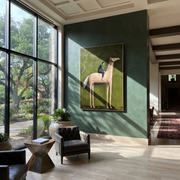 Western Stars Return at Dusk - figure and horse painting by Isabelle Laurent, modern Western vertical wall art – styled room scene view 1