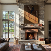 Amber Trail Return at Dusk - horse and rider painting by Isabelle Laurent, modern Western vertical wall art – styled room scene view 1