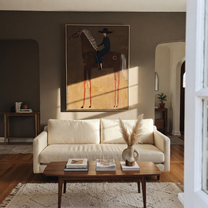 Amber Trail Return at Dusk - horse and rider painting by Isabelle Laurent, modern Western vertical wall art – styled room scene view 3