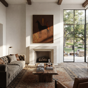 Amber Figure Rides into Umber - dark horse and rider painting by Isabelle Laurent, modern Western vertical wall art – styled room scene view 1
