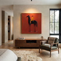 Ochre Stillness Fills the Red Square - black horse rider painting by Isabelle Laurent, modern Western square wall art – styled room scene view 5