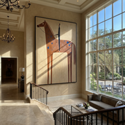 Blue Spots Cross the Brown Horse - spotted horse and figure painting by Isabelle Laurent, modern Western vertical wall art – styled room scene view 1
