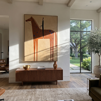 Blue Spots Cross the Brown Horse - spotted horse and figure painting by Isabelle Laurent, modern Western vertical wall art – styled room scene view 2