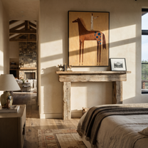The White Figure Stands above the Brown Horse - standing horse figure painting by Isabelle Laurent, modern Western vertical wall art – styled room scene view 4