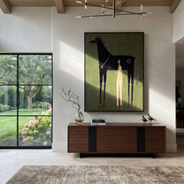 The Quiet Handler Meets the Black Horse - black horse and figure painting by Isabelle Laurent, modern Western vertical wall art – styled room scene view 1