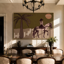 Palm Shadows Follow the Pinto Rider - desert horse rider painting by Isabelle Laurent, modern Western horizontal wall art – styled room scene view 1