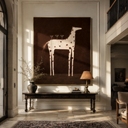 Three Glasses Balance on the Spotted Horse - white spotted horse painting by Isabelle Laurent, modern Western vertical wall art – styled room scene view 1