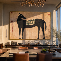 Black Horse Carries the Geometric Saddle - patterned black horse painting by Isabelle Laurent, modern Western horizontal wall art – styled room scene view 3