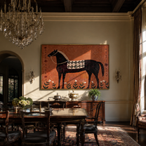 Flowers Border the Patterned Black Horse - decorative black horse painting by Isabelle Laurent, modern Western horizontal wall art – styled room scene view 2
