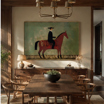 Black Hat Rides the Red Horse through Sage - red horse rider painting by Isabelle Laurent, modern Western horizontal wall art – styled room scene view 2