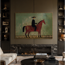 Black Hat Rides the Red Horse through Sage - red horse rider painting by Isabelle Laurent, modern Western horizontal wall art – styled room scene view 5