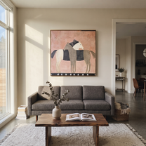 Three Horses Share Pink - three horse folk painting by Isabelle Laurent, modern Western square wall art – styled room scene view 4