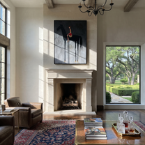 Red Saddle Meets Charcoal - black horse rider painting by Isabelle Laurent, modern Western vertical wall art – styled room scene view 3