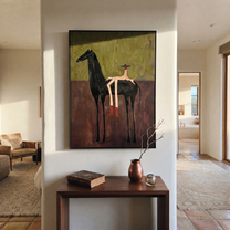 Red Boots Rest Black - black horse rider painting by Isabelle Laurent, modern Western vertical wall art – styled room scene view 4
