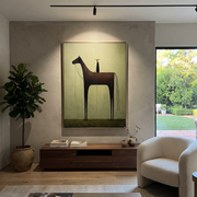 Black Horse Towers Sage - minimal black horse painting by Isabelle Laurent, modern Western vertical wall art – styled room scene view 1