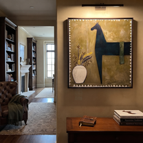 Flowers Wait Beside Horse - black horse and vase painting by Isabelle Laurent, modern Western square wall art – styled room scene view 3
