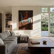 Red Rider Towers Umber - spotted blue horse painting by Isabelle Laurent, modern Western vertical wall art – styled room scene view 2