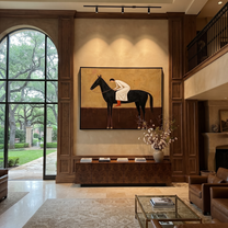 White Dress Leans Forward - black horse woman painting by Isabelle Laurent, modern Western horizontal wall art – styled room scene view 5