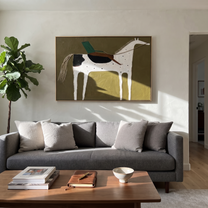 Green Rider Crosses Olive - spotted white horse painting by Isabelle Laurent, modern Western horizontal wall art – styled room scene view 5