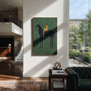Mustard Reader Rides Green - black horse reader painting by Isabelle Laurent, modern Western vertical wall art – styled room scene view 1