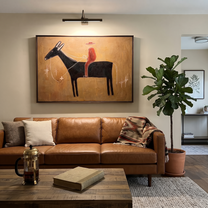 Red Silhouette Crosses Clay - black horse rider painting by Isabelle Laurent, modern Western horizontal wall art – styled room scene view 2