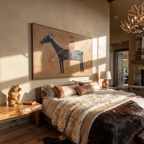 Red Silhouette Crosses Clay - black horse rider painting by Isabelle Laurent, modern Western horizontal wall art – styled room scene view 3