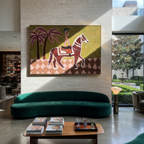 Palm Shadows Follow Rider - palm horse rider painting by Isabelle Laurent, modern Western horizontal wall art – styled room scene view 2