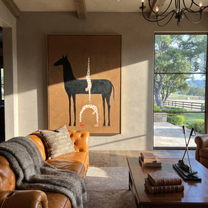 Inverted Stars Meet Horse - horse acrobat painting by Isabelle Laurent, modern Western vertical wall art – styled room scene view 1