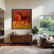 Coral Horse Walks Gold - striped folk horse painting by Isabelle Laurent, modern Western square wall art – styled room scene view 1