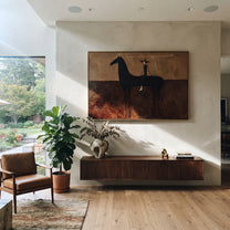 Wide Brim Measures Distance - black horse rider painting by Isabelle Laurent, modern Western horizontal wall art – styled room scene view 1