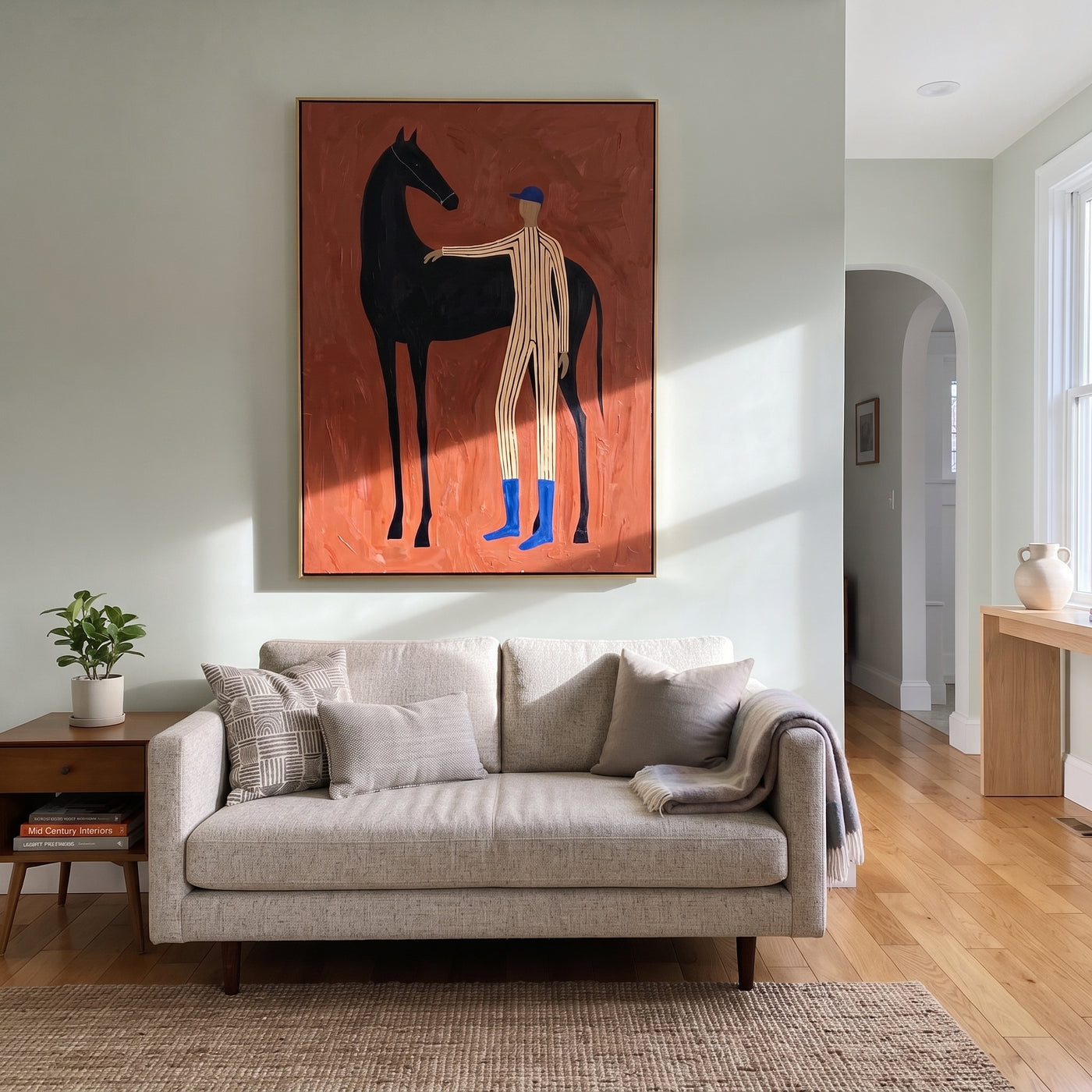 Blue Boots Steady Black - horse handler portrait painting by Isabelle Laurent, modern Western vertical wall art – styled room scene view 3