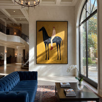 Ochre Field Lifts Rider - black horse rider painting by Isabelle Laurent, modern Western vertical wall art – styled room scene view 1