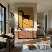 Three Glasses Wait Upright - black horse cocktail painting by Isabelle Laurent, modern Western vertical wall art – styled room scene view 2