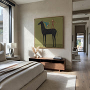 Two Acrobats Test Balance - horse acrobat folk painting by Isabelle Laurent, modern Western square wall art – styled room scene view 1