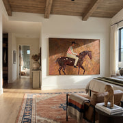 Stripes Cross Painted Hills - spotted horse rider painting by Isabelle Laurent, modern Western horizontal wall art – styled room scene view 1