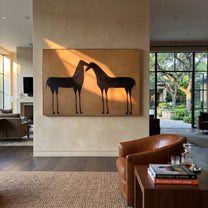 Two Shadows Meet Warmth - black horse pair painting by Isabelle Laurent, modern Western horizontal wall art – styled room scene view 2