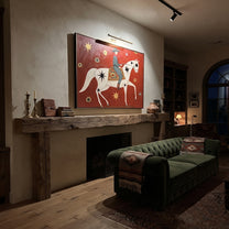 Star Horse Crosses Crimson - celestial white horse painting by Isabelle Laurent, modern Western horizontal wall art – styled room scene view 5