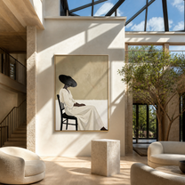 Black Brim Waits Seated - seated woman in white painting by Marcus Lau, retro modern vertical wall art – styled room scene view 1
